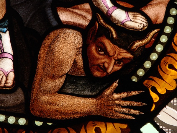 Demon in a Stained Glass Window of Saint-Martin de Florac
